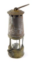 A steel and brass miner's lamp, lacking plate, possibly Protector Type 6, 26cm high.