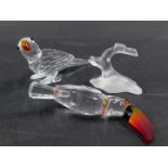 Two Swarovski crystal birds, comprising toucan on perch with orange crystal beak, 8cm high (AF), an