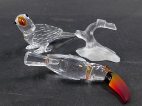 Two Swarovski crystal birds, comprising toucan on perch with orange crystal beak, 8cm high (AF), an