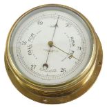 A Sestrel brass cased ship's barometer, stamped Sharman D Neill Limited Belfast, 26cm diameter.