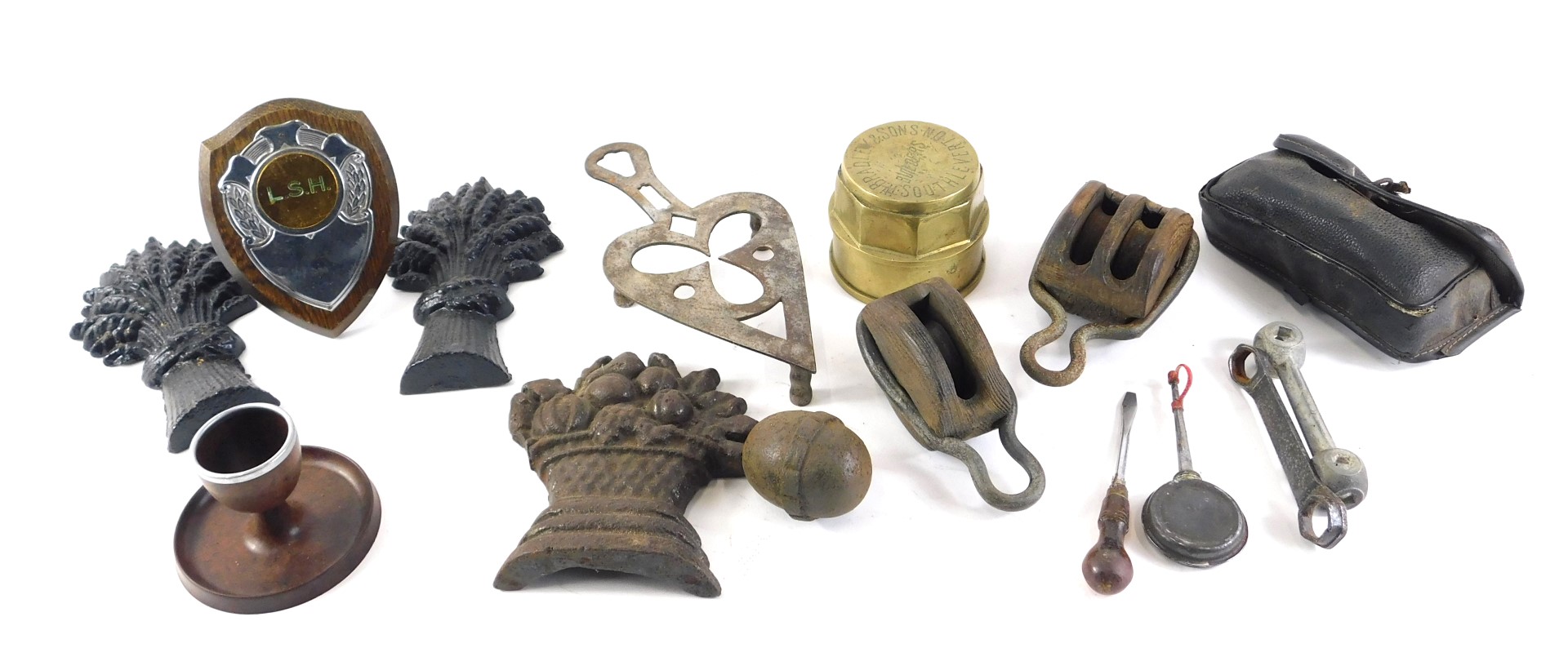 A collection of items, to include a brass wheel cap for W Bradley & Sons South Leverton Builders, me