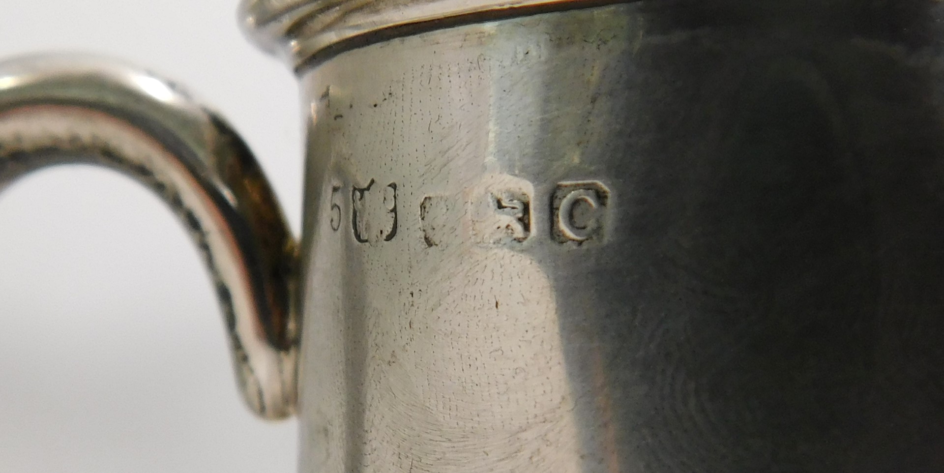 A George V silver Christening cup, of plain design, on a stepped foot, Birmingham 1927, 8.5cm high, - Image 3 of 3