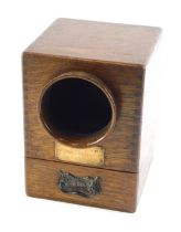 An early 20thC oak ballot box, with brass plaque engraved Presented to 5615 by Primo J Greatorex Dec