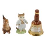 Collectables, comprising a Royal Albert Tom Kitten, a Wade seated rabbit, and a miniature Bell's whi