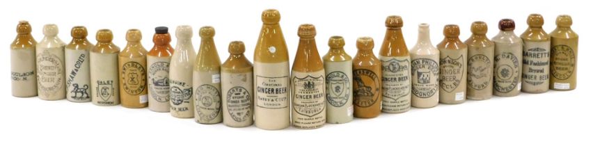 A collection of stoneware ginger beer bottles, various makers to include Lincolnshire.