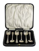 A cased set of six silver arch top teaspoons, each with three drop design, Birmingham 1929, 2.06oz,