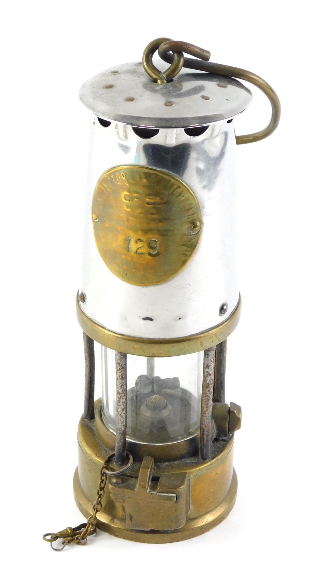 A Protector polished steel and brass miner's lamp, numbered 129, possibly Type 6, 25cm high.