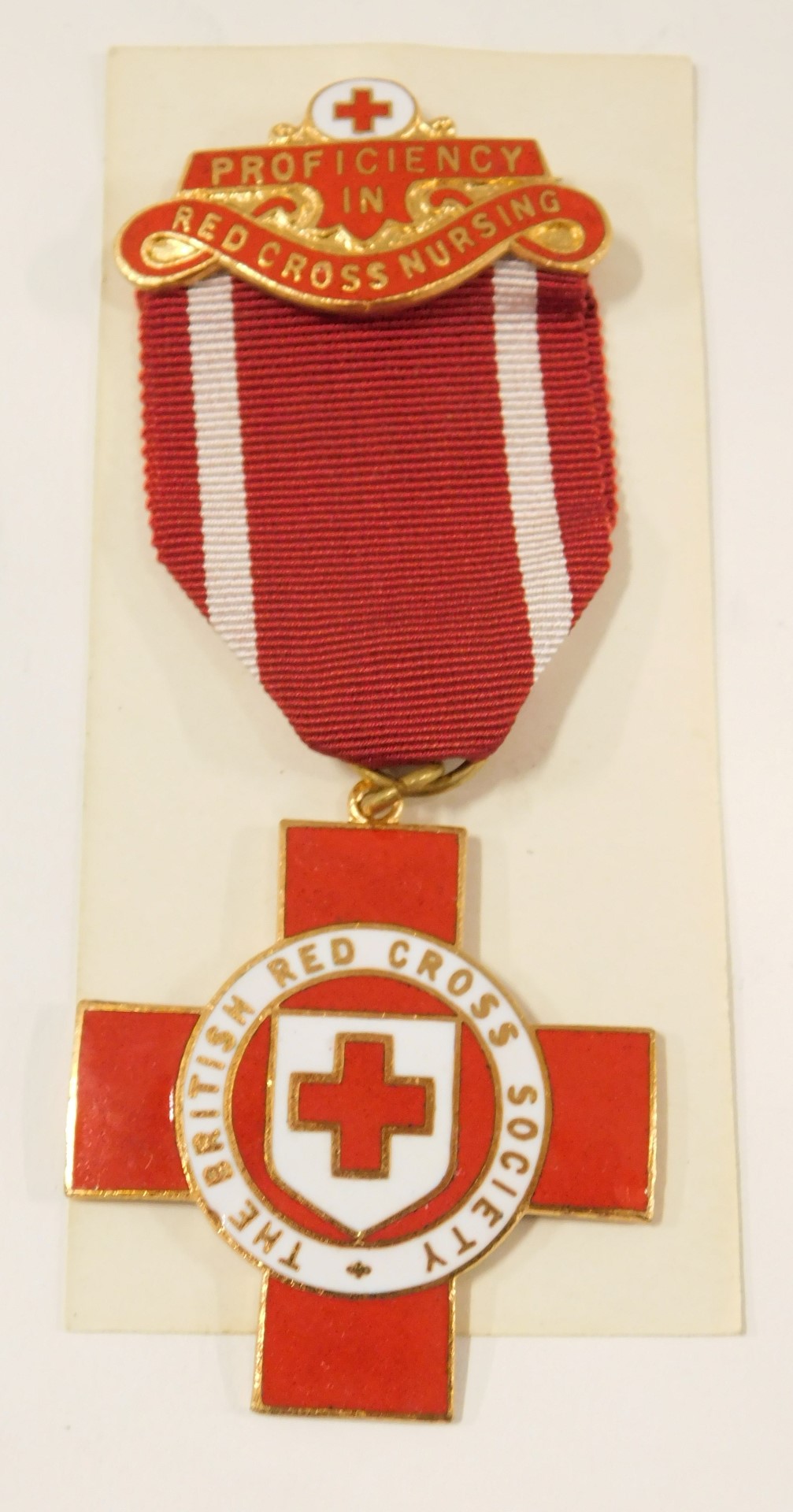 A British Red Cross Society enamel nurse's badge, and a first aid Red Cross badge, boxed. (2) - Image 2 of 2