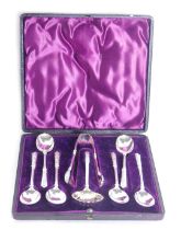 A cased set of 20thC silver plated spoons, tongs, and sifters, comprising six teaspoons, a pair of t