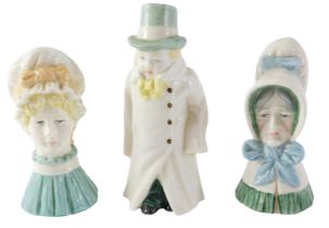 Three Royal Worcester candle snuffers, comprising 1976 budge, 12cm high, lady in hat, 10cm high, and