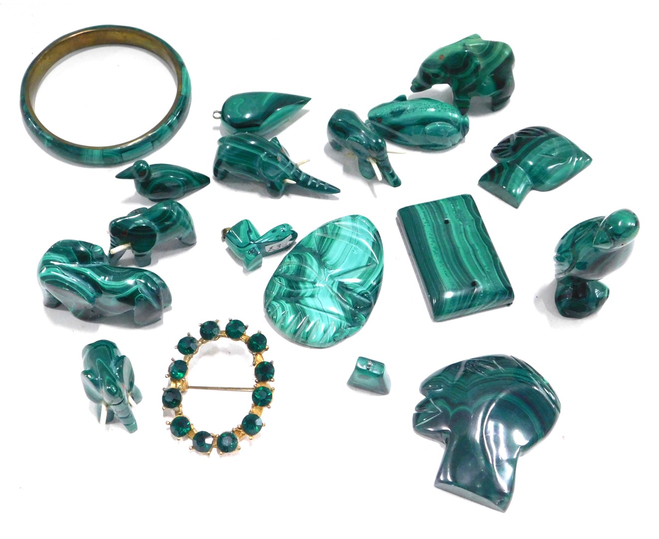 A group of malachite, comprising pendants, eggs, bangle, carved animal figures, etc. (a quantity)