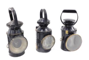 Three railway lamps, one stamped British Rail East, Cillamarch West, another Great Central Railway B