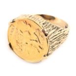 A replica Edward VII half gold sovereign dress ring, the replica coin dated 1907, in rubbed bark eff