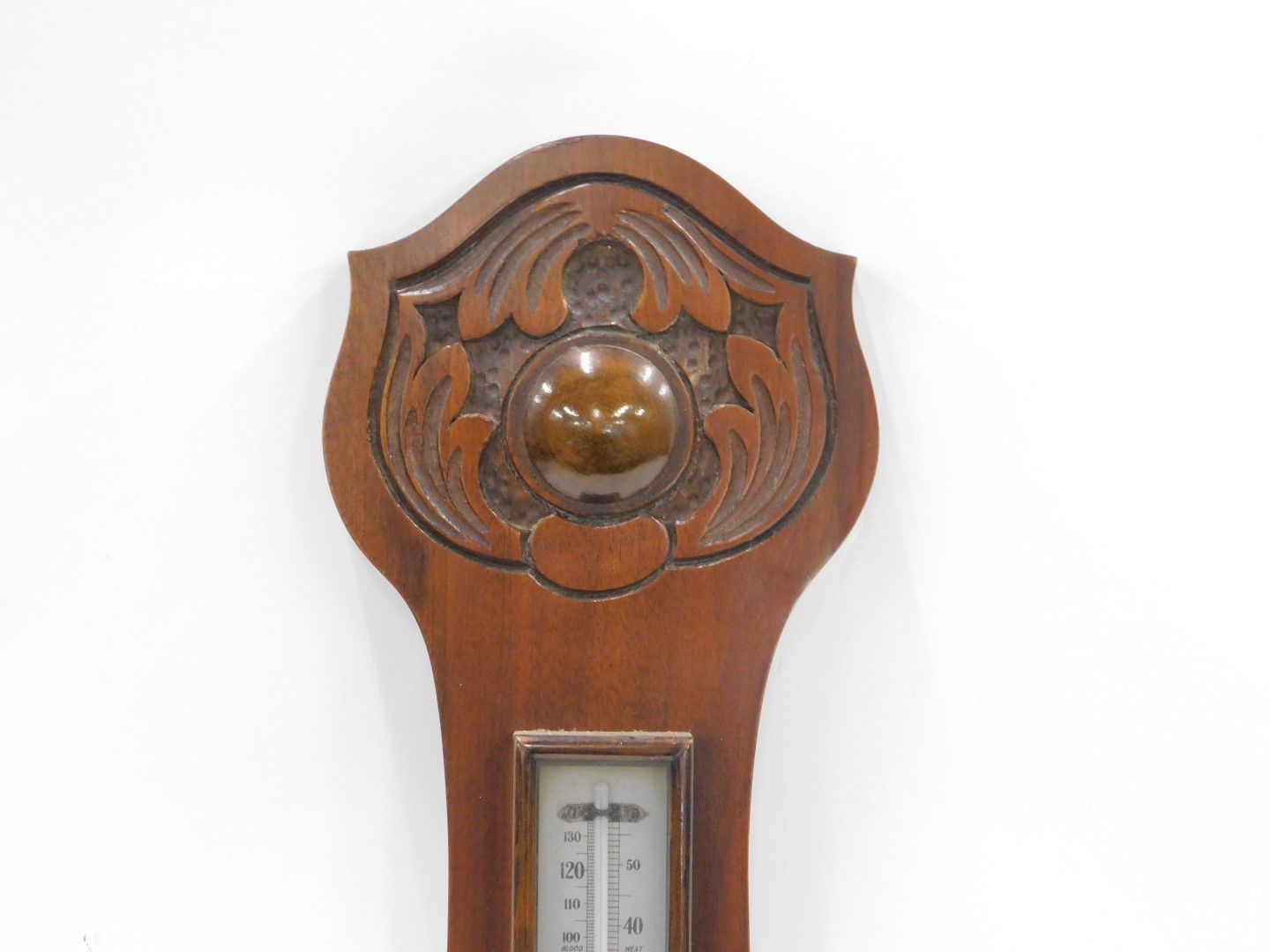 An Edwardian mahogany aneroid wheel shaped barometer with thermometer, in a carved case, 82cm high. - Image 2 of 4
