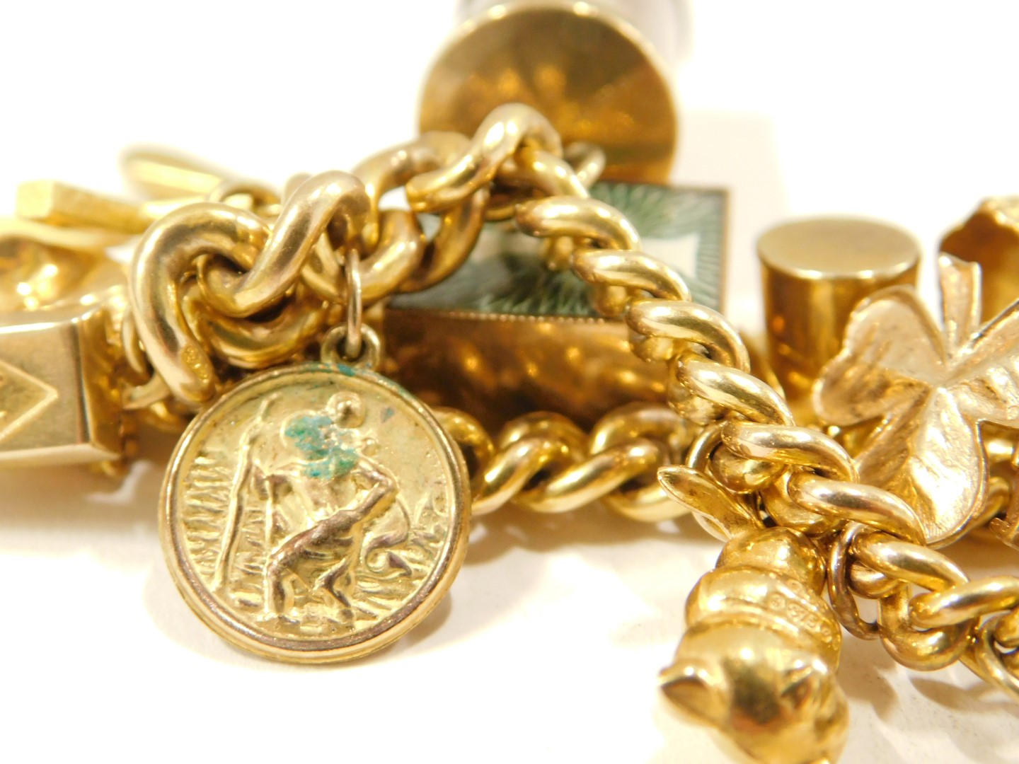 A 9ct gold charm bracelet, the curb link bracelet with safety chain and heart shaped padlock, variou - Image 4 of 4