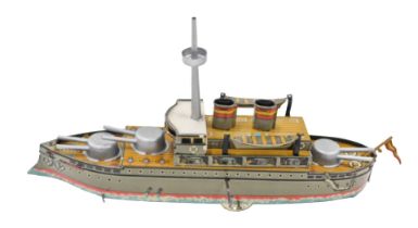 A Paya Spanish tinplate model of a battleship, boxed.