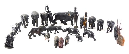 A quantity of African tribal carvings, to include various elephants, lions, hippo, figures, etc. (2