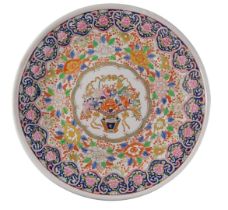 An oriental porcelain charger, decorated with flowers, leaves, etc., in polychrome enamels, pseudo m