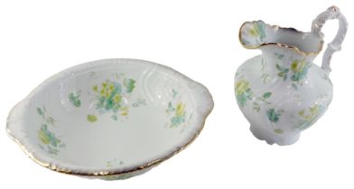 A John Maddock & Sons porcelain jug and bowl, decorated with yellow flowers, the bowl 44cm wide.