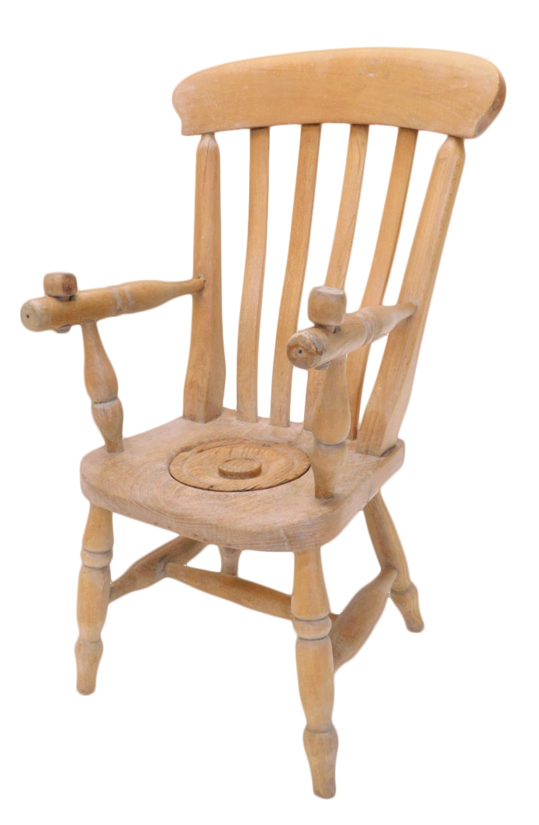 A child's commode chair, with slatted back, covered recess to elm seat, on turned legs with H stretc