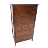 A Stag Minstrel mahogany chest of drawers, the top with a moulded edge above an arrangement of five
