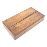 A two section oak cutlery box, with two hinged lids, 38.5cm wide.