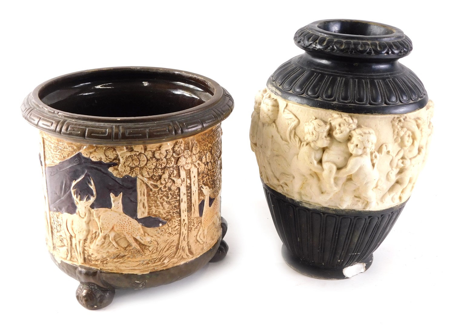 A Denby pottery jardiniere decorated in Oriental style with raised figures, animals, etc., and a sim