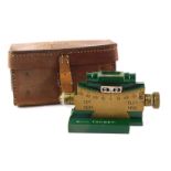 A Vickers clinometer, stamped 303, the leather case also stamped Machine Gun Case Mark 2, etc., 17cm