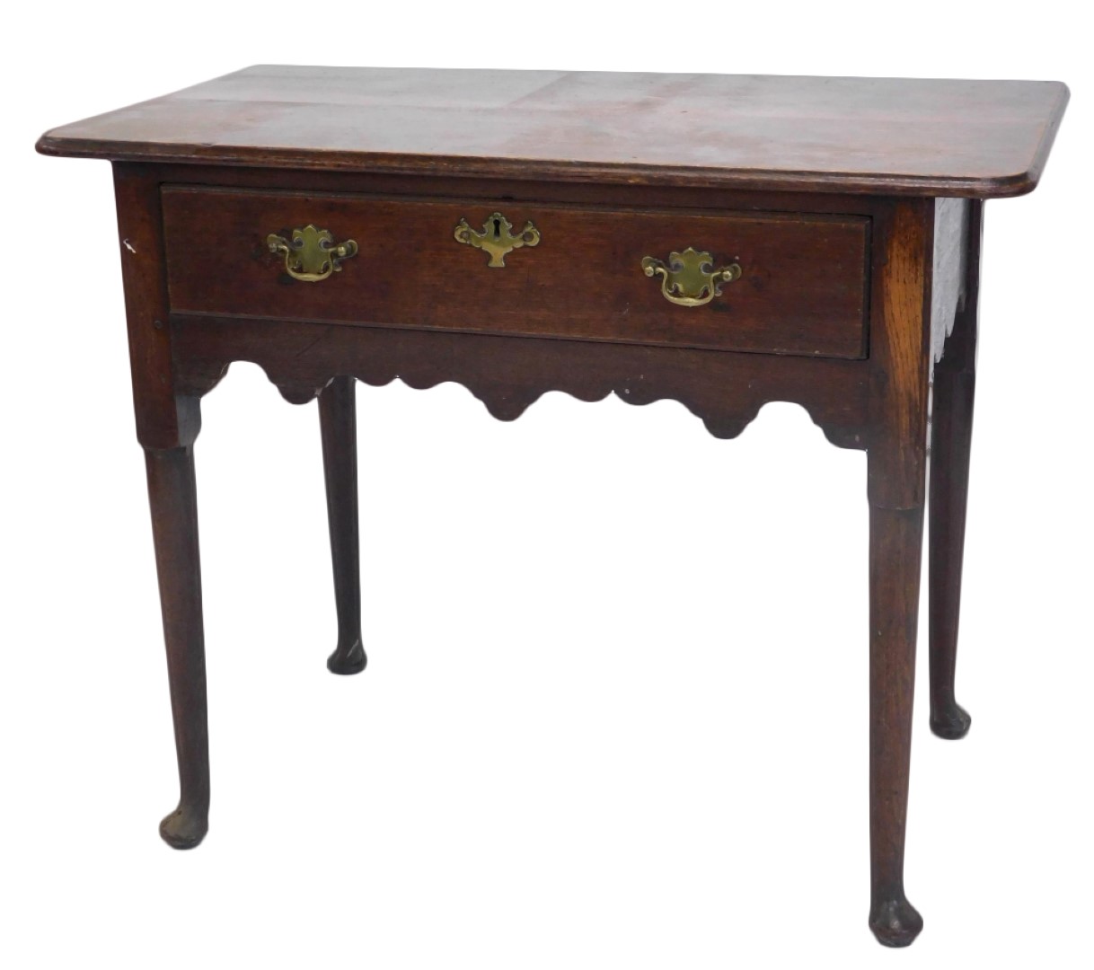 An 18thC oak low boy, the rectangular top with rounded corners and a moulded edge, above a frieze dr