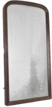 A Victorian figured mahogany arched wall mirror, from a cheval, 130cm high, 72cm wide.