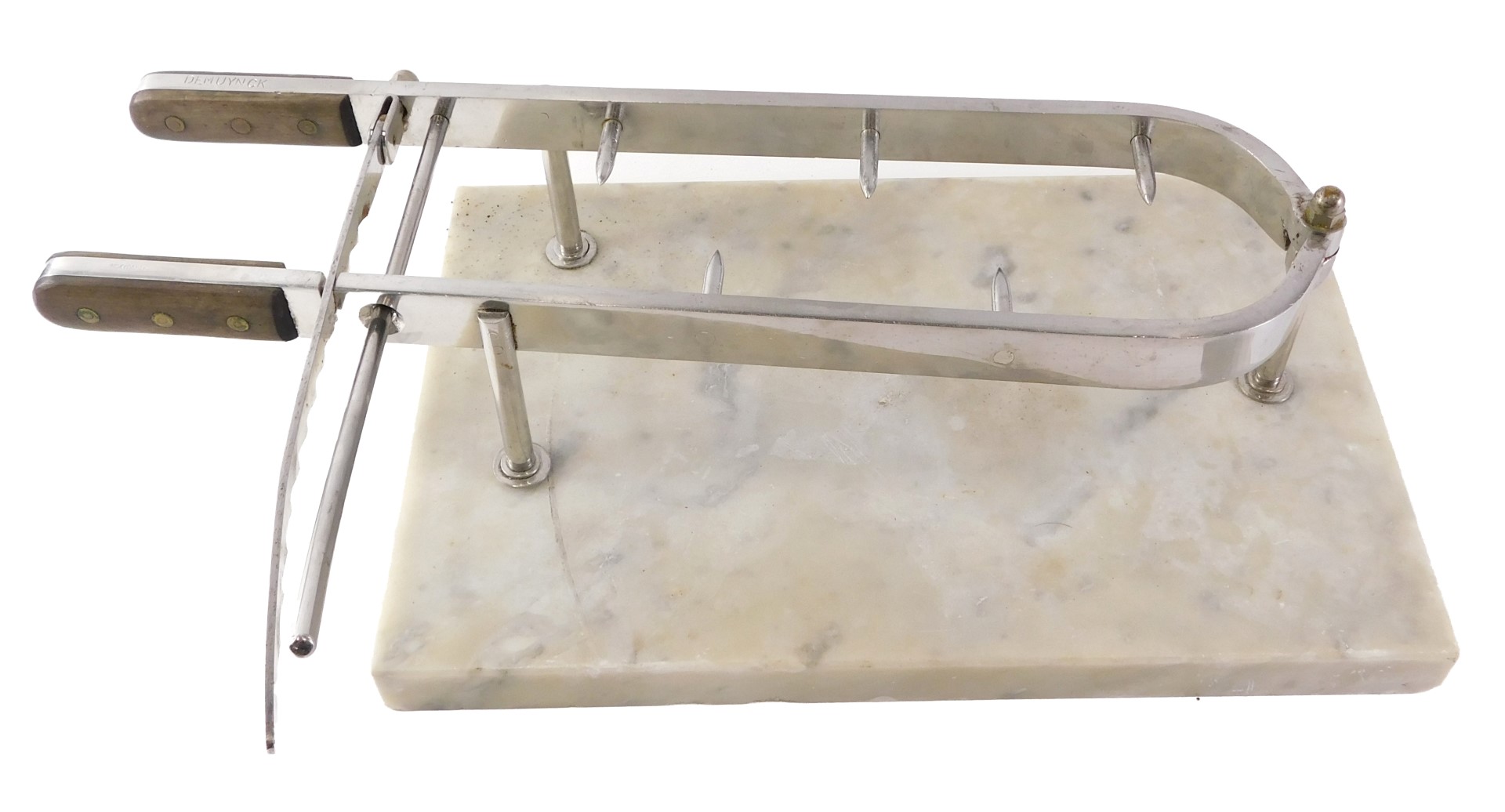 A Demeynck meat joint clamp or holder, with marble base, and wooden handles, the base 43cm long.