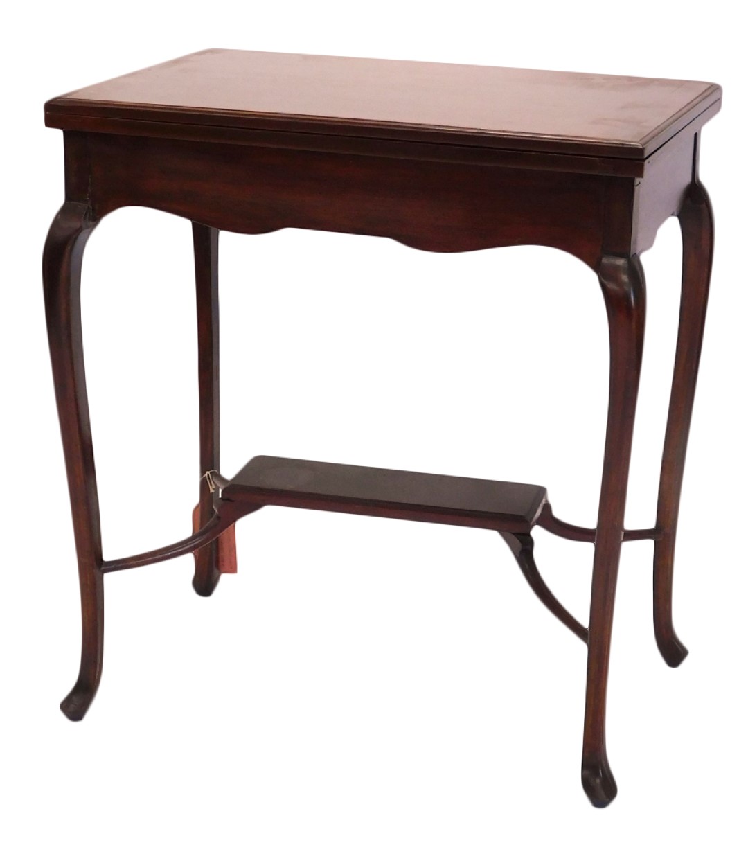 An Edwardian mahogany card table, the rectangular top hinged to reveal a baize interior, on cabriole