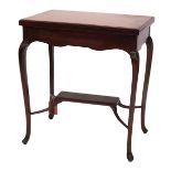 An Edwardian mahogany card table, the rectangular top hinged to reveal a baize interior, on cabriole