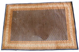 A machine woven German wool Keshan carpet, 295cm x 199cm.