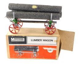 A Mamod lumber wagon, LW.1, with polystyrene logs.