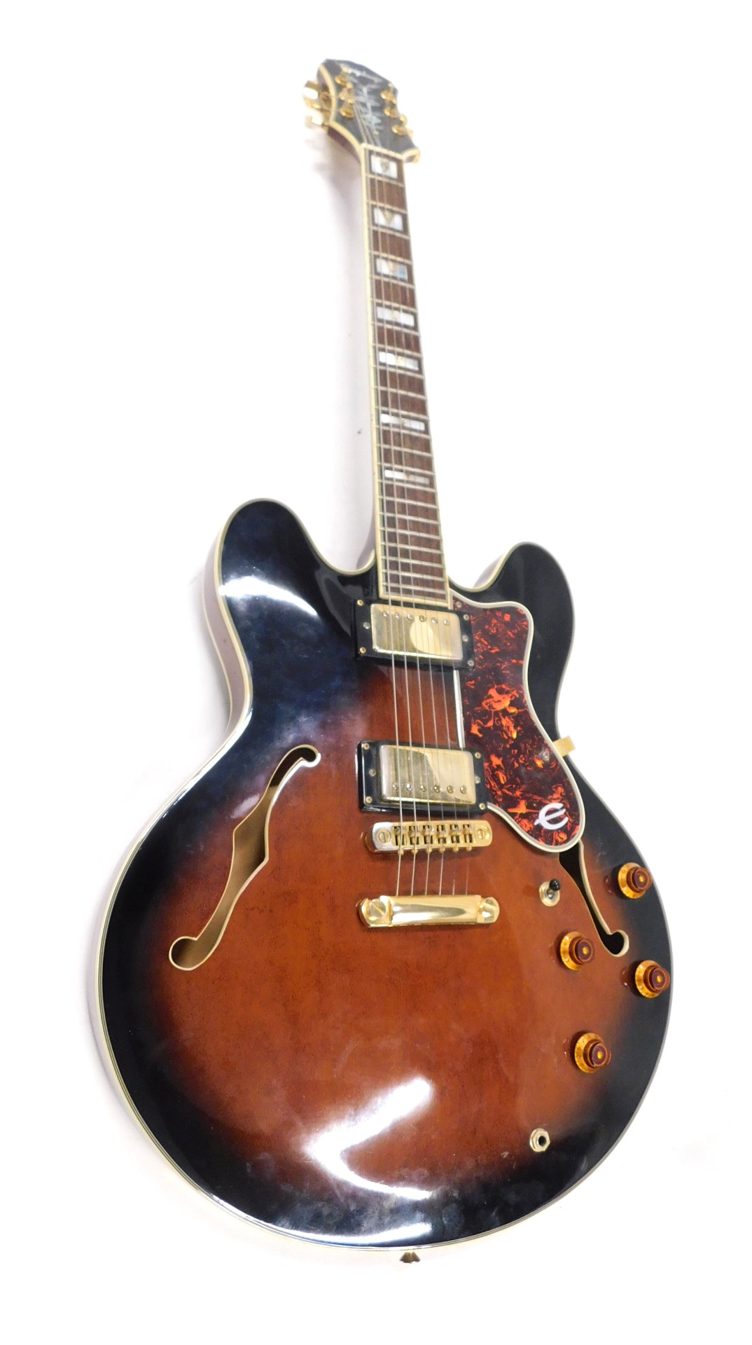 An Epiphone ES-335 electric guitar, with mother of pearl fret inlays, with padded travel case.