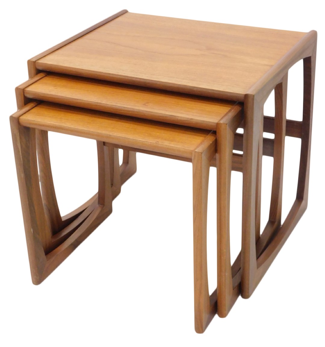 A nest of three G-Plan style teak tables, each on end supports, the largest 43cm wide.