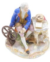 A Vienna porcelain figure group, modelled in the form of a gentleman beside a spinning wheel and a d