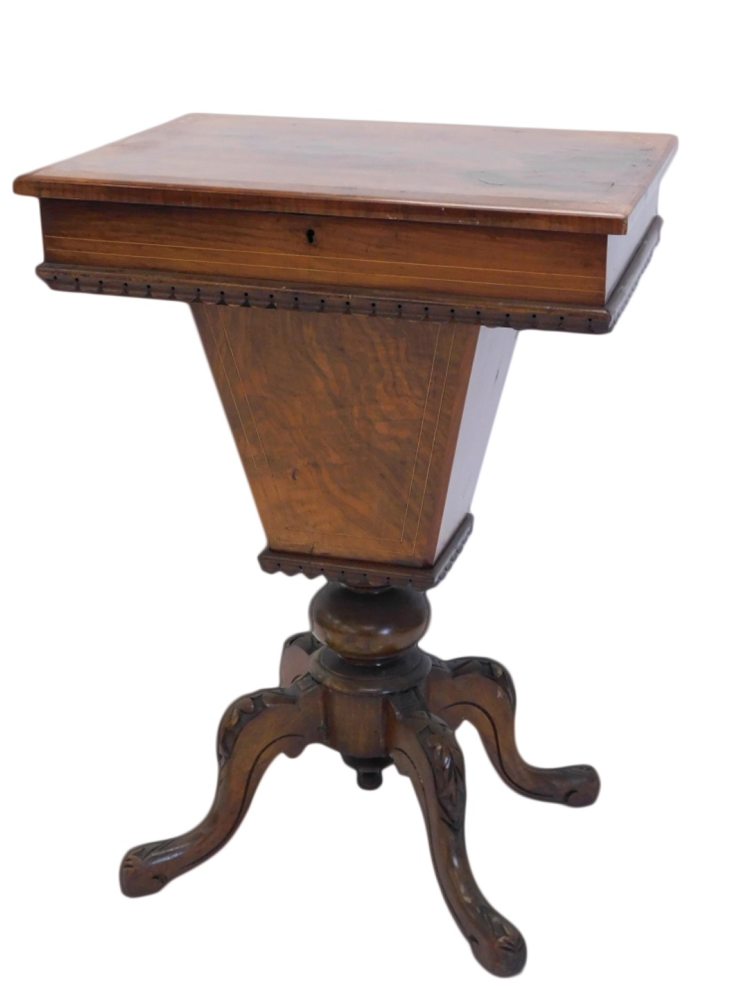 A Victorian walnut and boxwood strung work table, the hinged lid enclosing a fitted interior and a r