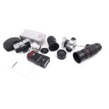 A Minolta auto focus lens, other lenses, cameras, etc.