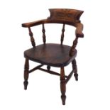 A child's ash and elm smoker's bow chair, carved with the name Hilda.