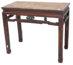 A Chinese red stained altar table, with a pierced frieze, on shaped legs, 90cm high, 92cm wide.