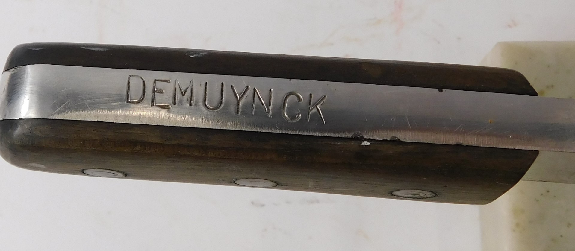 A Demeynck meat joint clamp or holder, with marble base, and wooden handles, the base 43cm long. - Image 2 of 3