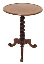 A Victorian mahogany occasional table, the circular dished top, on a spirally turned column, on trip