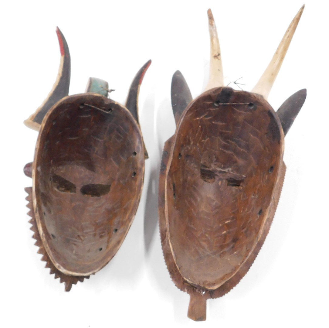 An African tribal mask, with two horns, with a black face, etc., 50cm high, and a similar mask with - Image 2 of 2