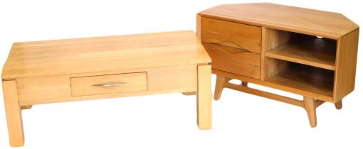 A light oak television stand, with two drawers and a shelf, on tapering legs, 100cm wide, and a ligh