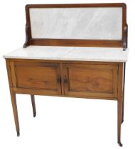 An Edwardian mahogany chequer banded wash stand, with a white marble splash back and top, on square