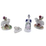 A pair of Staffordshire spill vases, each modelled with a sheep, Staffordshire figure of a turk, and