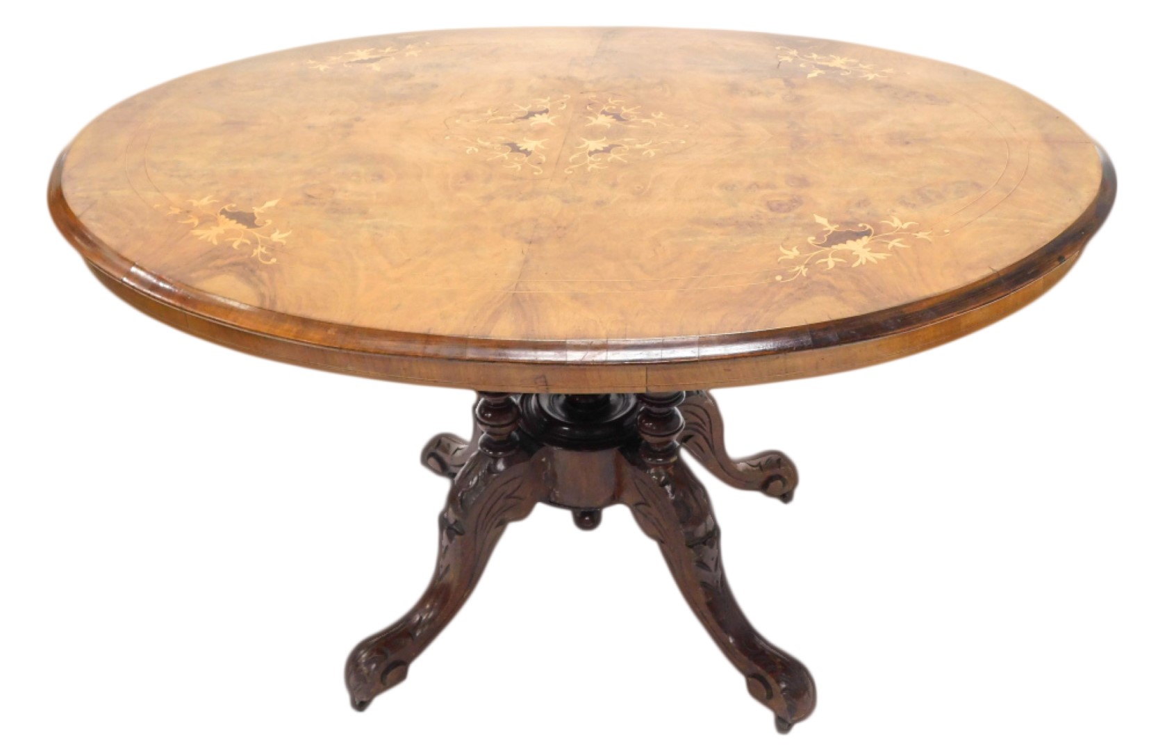 A Victorian walnut and marquetry oval breakfast table, on four turned supports with carved splay leg