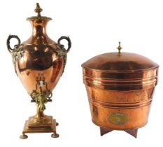 A 19thC copper and brass two handled tea urn, 60cm high, and a dolphin beer filter with associated l